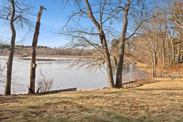 a view of ocean view with large trees