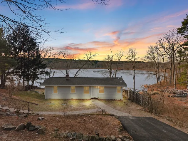 a picture of a bathroom with a shower