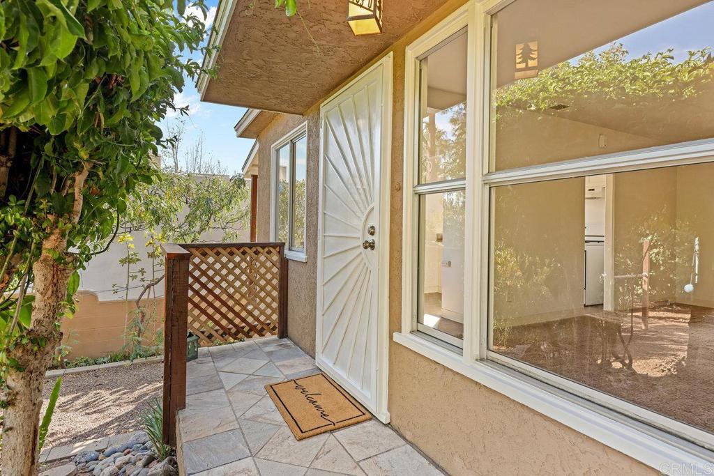 4530-32 4th Street La Mesa, CA 91941 - Photo 2 of 50 a view of a balcony with wooden floor and door