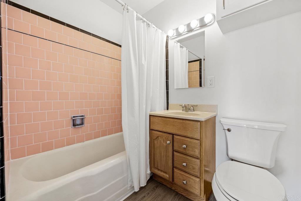 4530-32 4th Street La Mesa, CA 91941 - Photo 24 of 50 a bathroom with a sink a toilet and shower