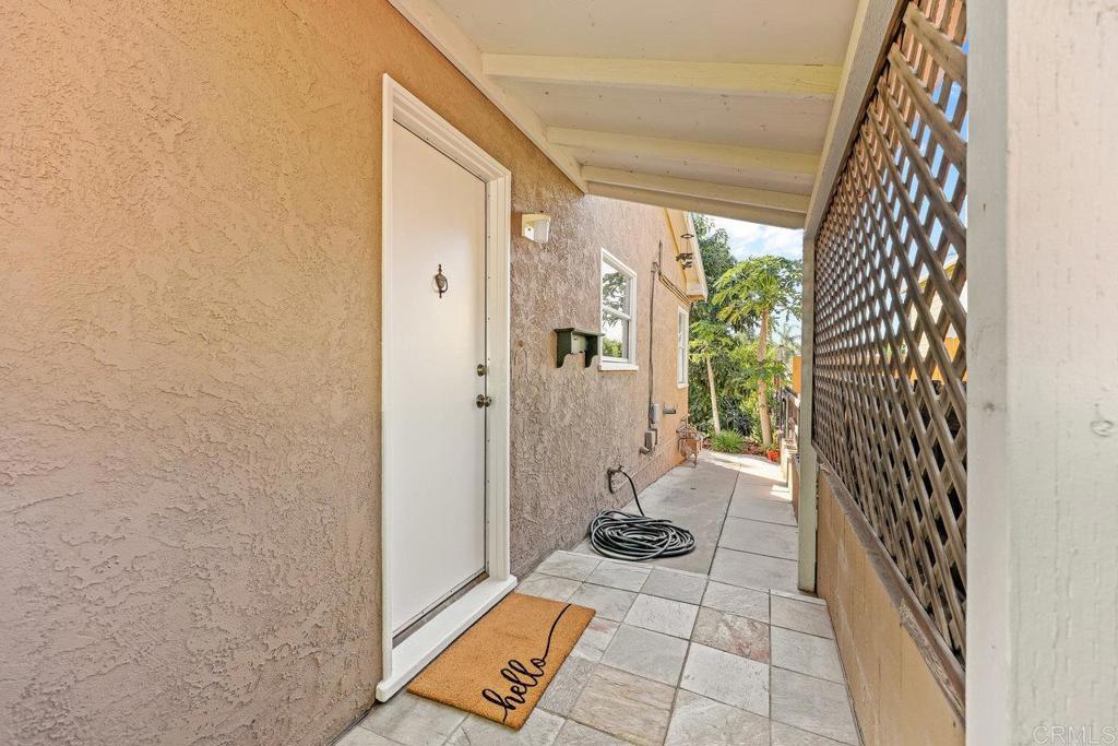 4530-32 4th Street La Mesa, CA 91941 - Photo 25 of 50 a view of a door and chair in the balcony