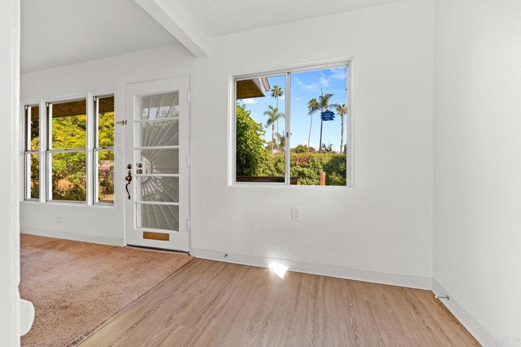 4530-32 4th Street La Mesa, CA 91941 - Photo 9 of 50 an empty room with wooden floor and windows