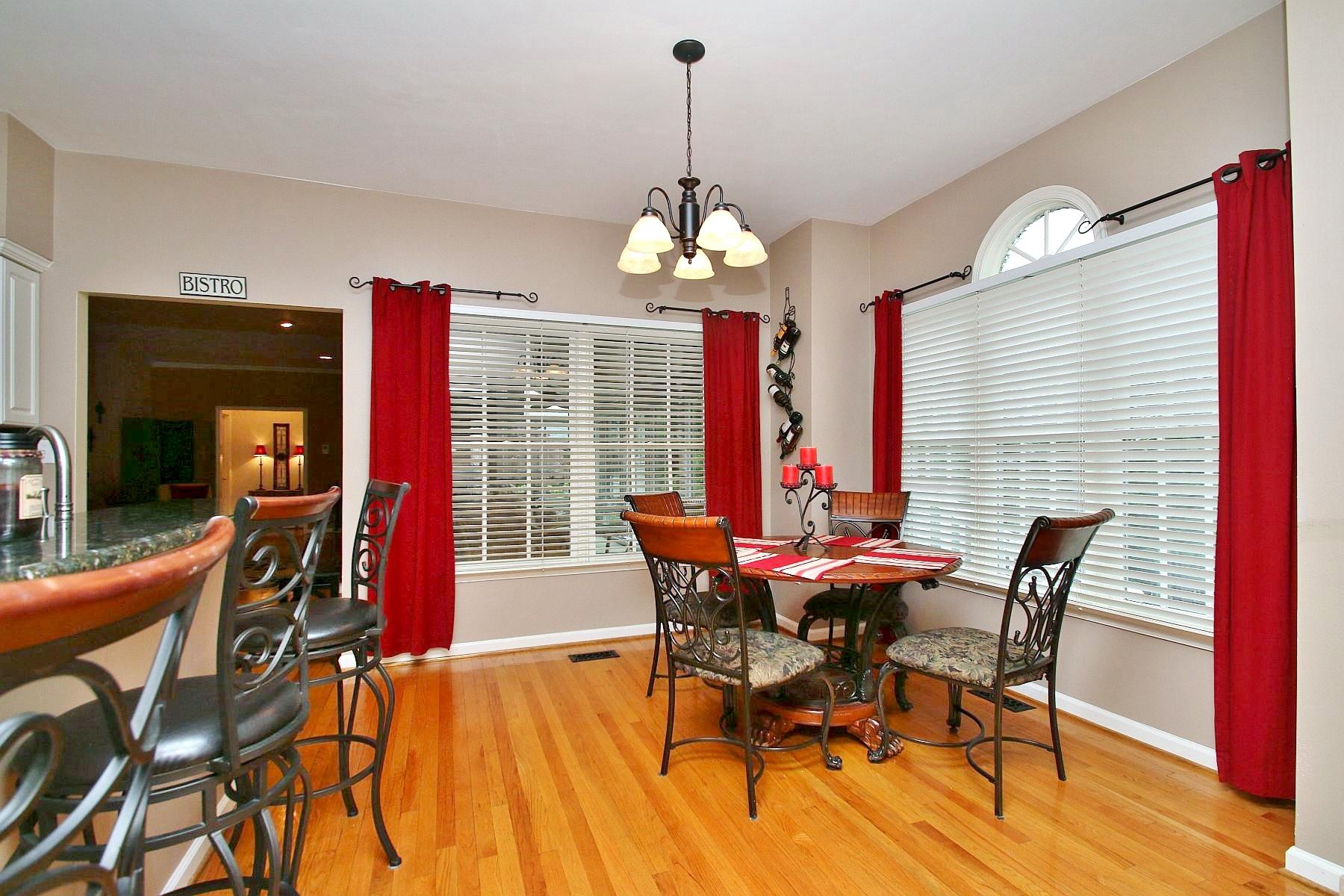 425 Stonehaven Lane Blue Ridge, VA 24064 - Photo 14 of 50 a view of a dining room with furniture window and wooden floor