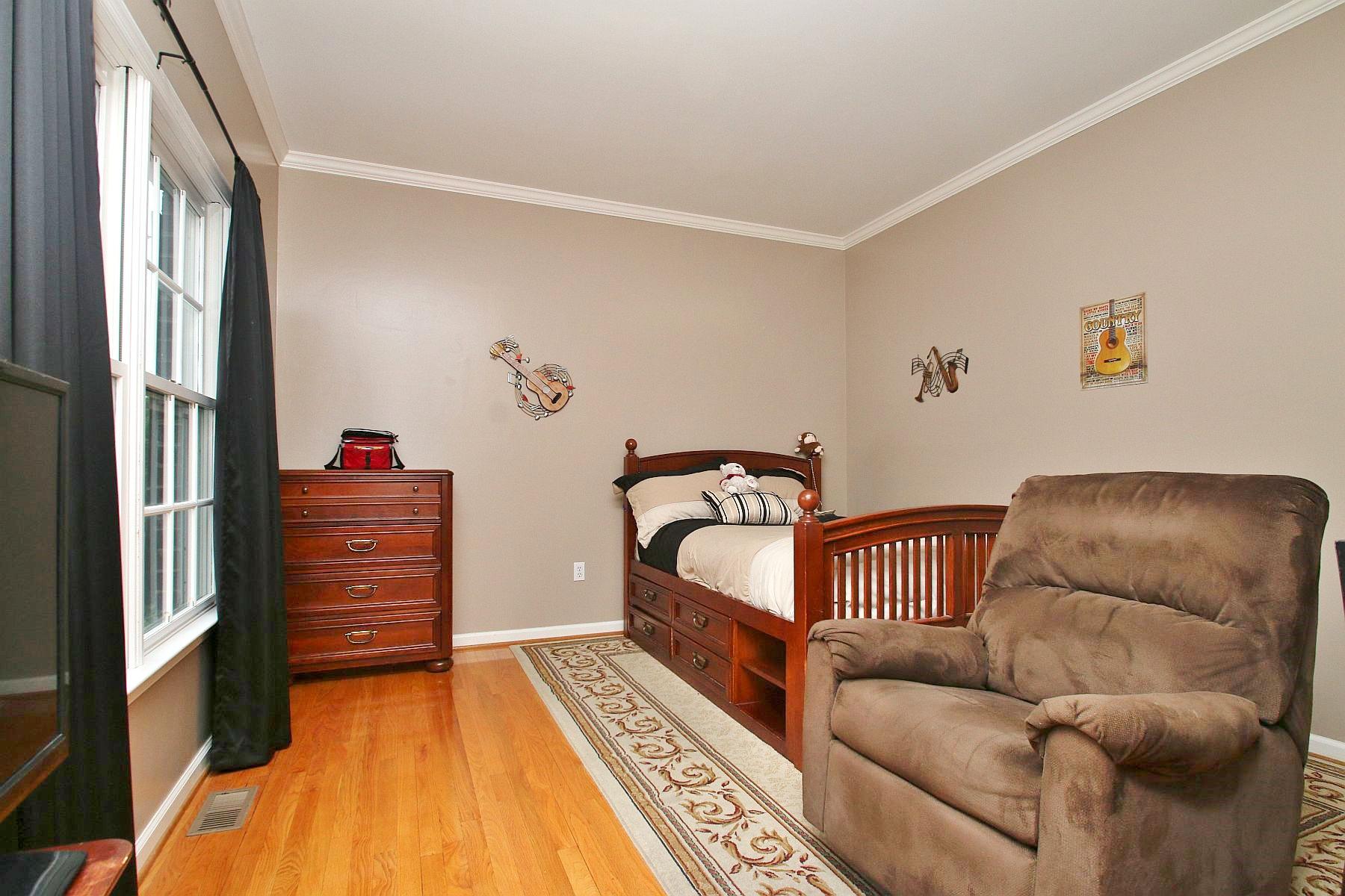 425 Stonehaven Lane Blue Ridge, VA 24064 - Photo 4 of 50 a bedroom with furniture and a rug