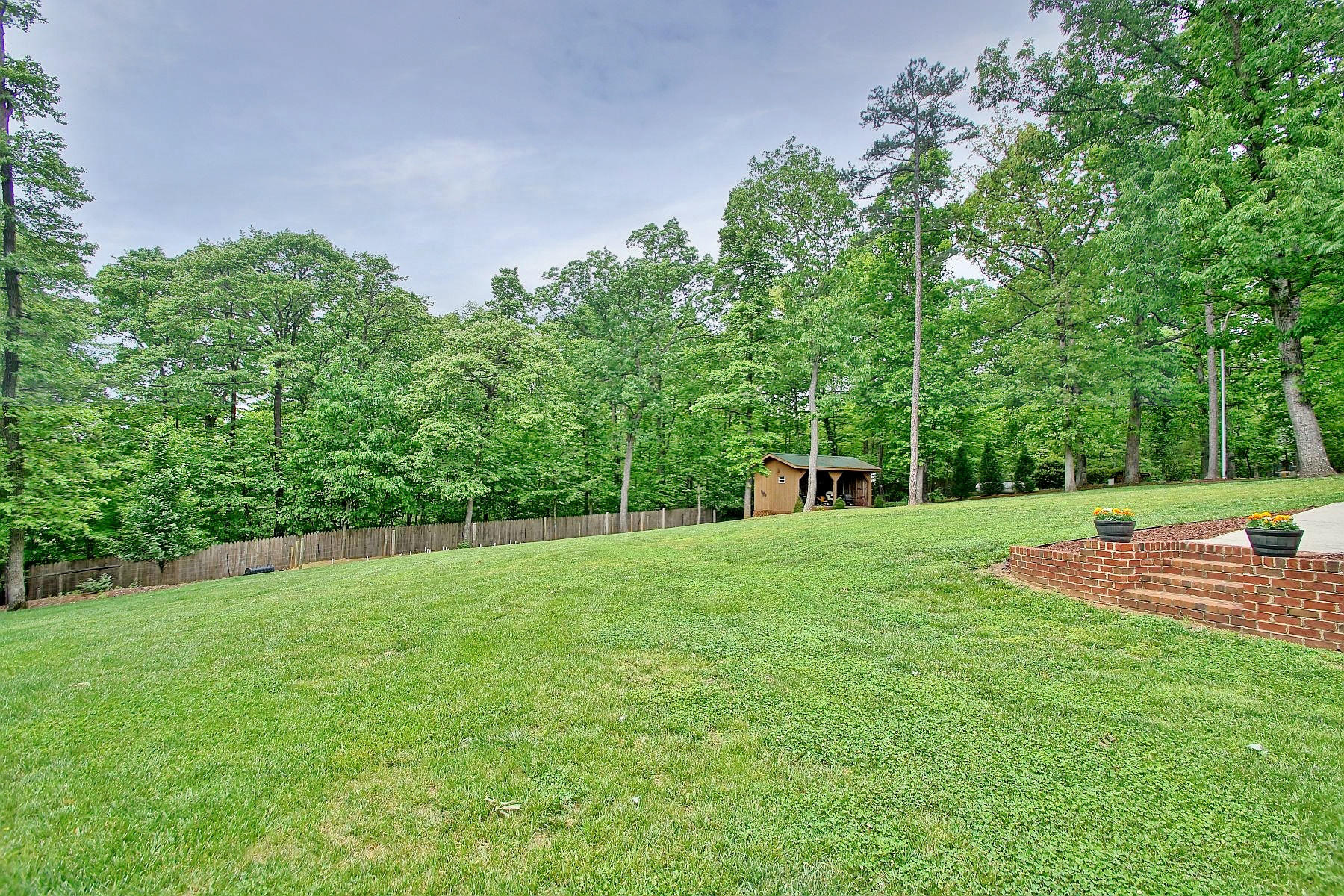 425 Stonehaven Lane Blue Ridge, VA 24064 - Photo 50 of 50 a view of a backyard with a garden
