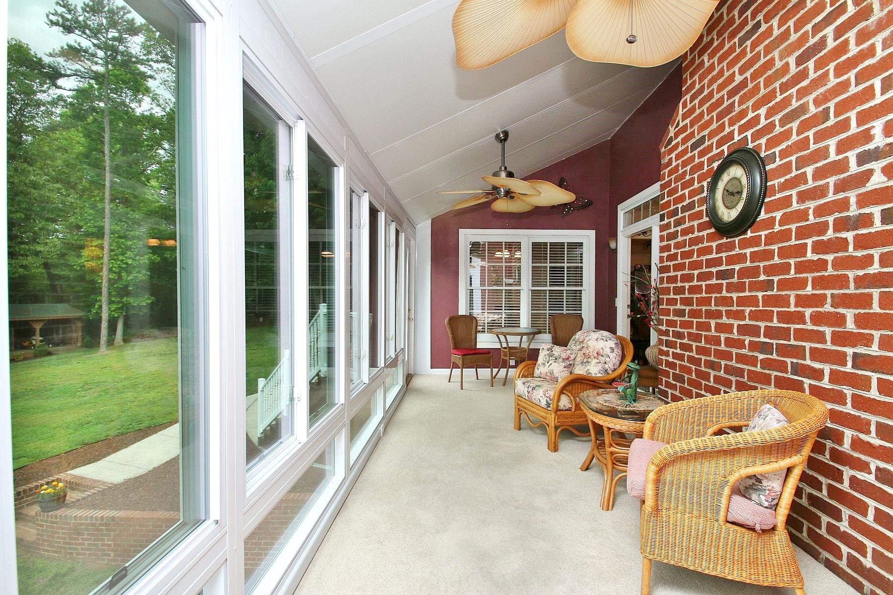 425 Stonehaven Lane Blue Ridge, VA 24064 - Photo 9 of 50 a balcony with furniture and garden view