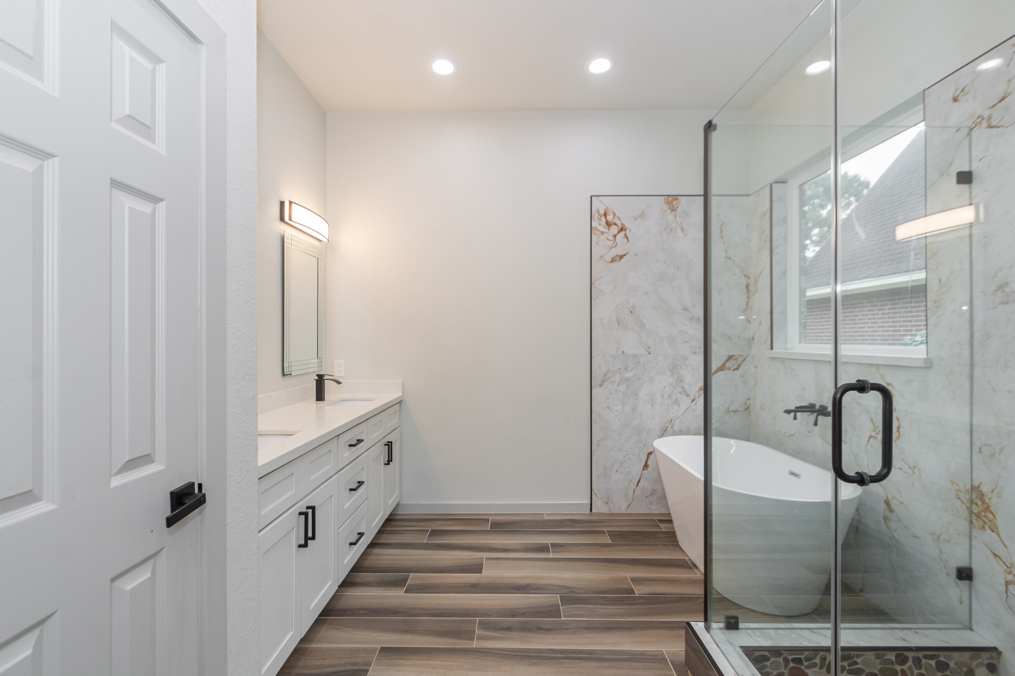 2190 Riverside Drive West Columbia, TX 77486 - Photo 13 of 39 a bathroom with double vanity and a shower