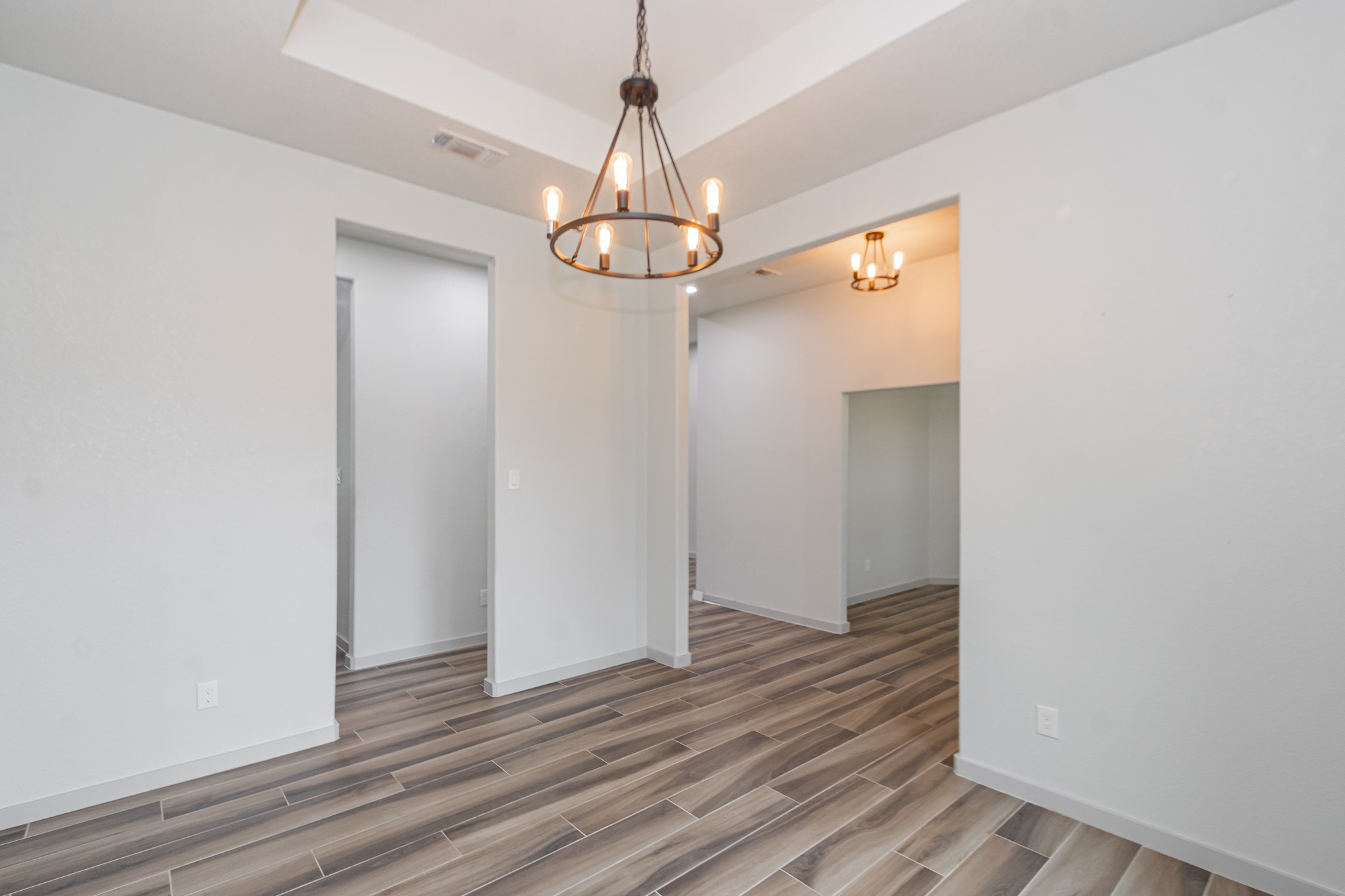 2190 Riverside Drive West Columbia, TX 77486 - Photo 19 of 39 a view of a hallway with wooden floor