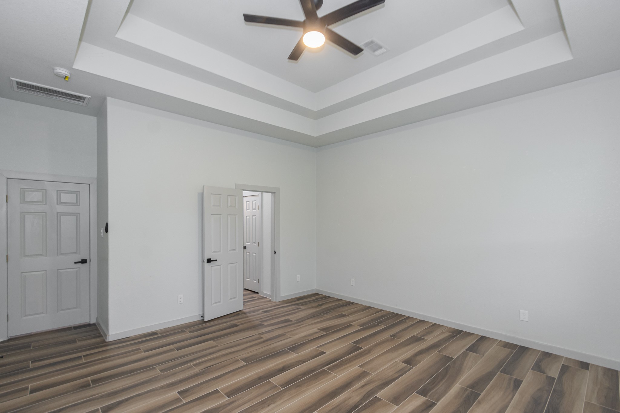 2190 Riverside Drive West Columbia, TX 77486 - Photo 10 of 39 wooden floor in an empty room