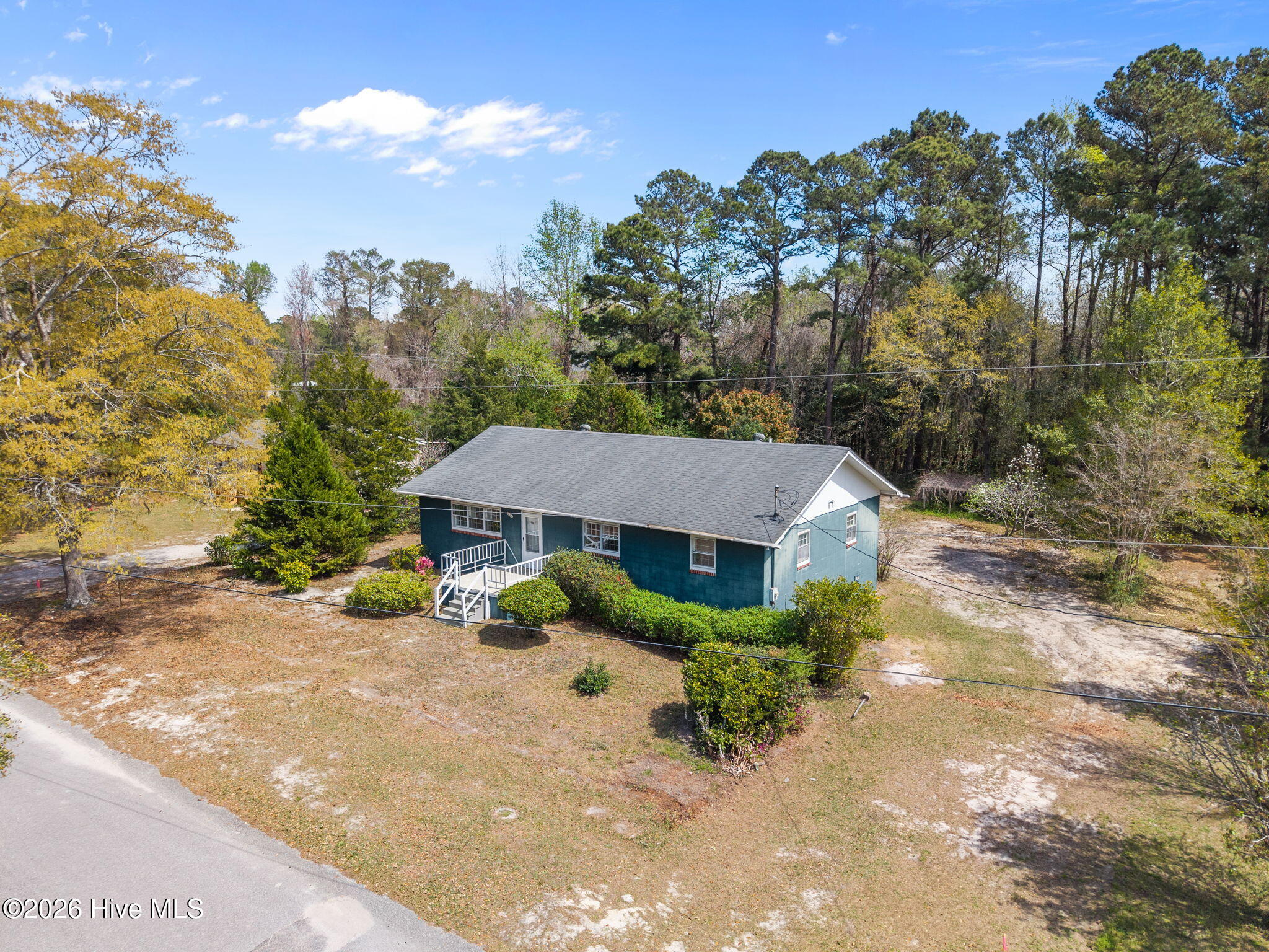111 King Moore Road Leland, NC 28451 - Photo 1 of 51 41-web-or-mls-DJI_20260324134316_0904_D