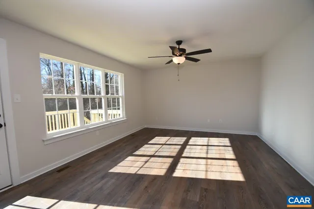 a view of an empty room and window