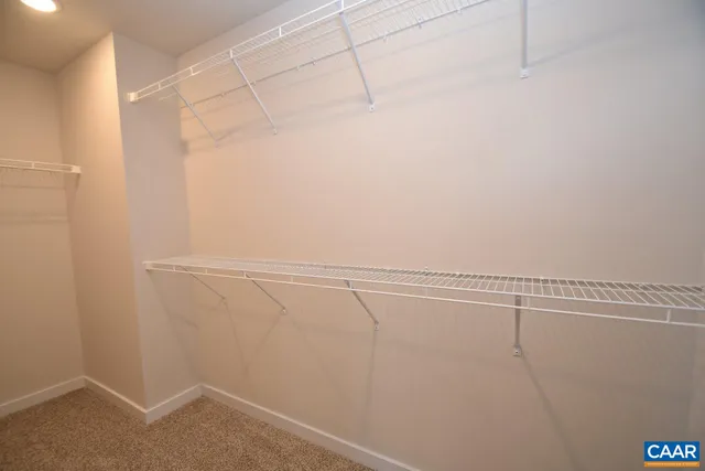 a view of a room with racks on the wall