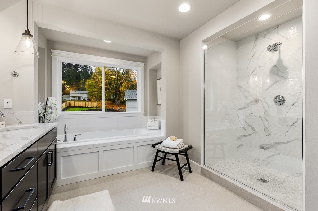 22915 31st Avenue Southeast Bothell, WA 98021 - Photo 31 of 40 a bathroom with a bathtub and a sink