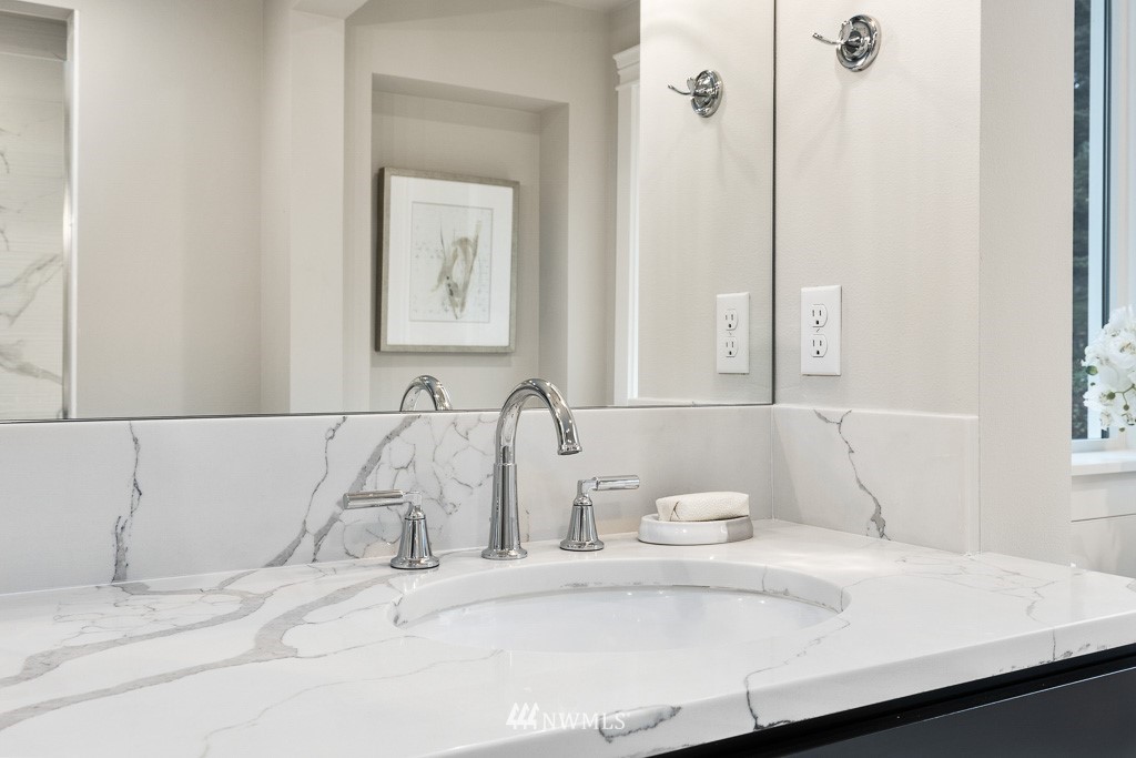 22915 31st Avenue Southeast Bothell, WA 98021 - Photo 32 of 40 a bathroom with a sink and a mirror