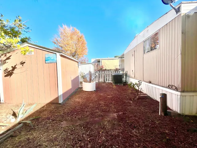 a view of a back yard of the house