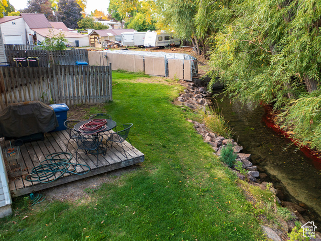 190 West 700 North Logan, UT 84321 - Photo 24 of 51 View of yard with a deck