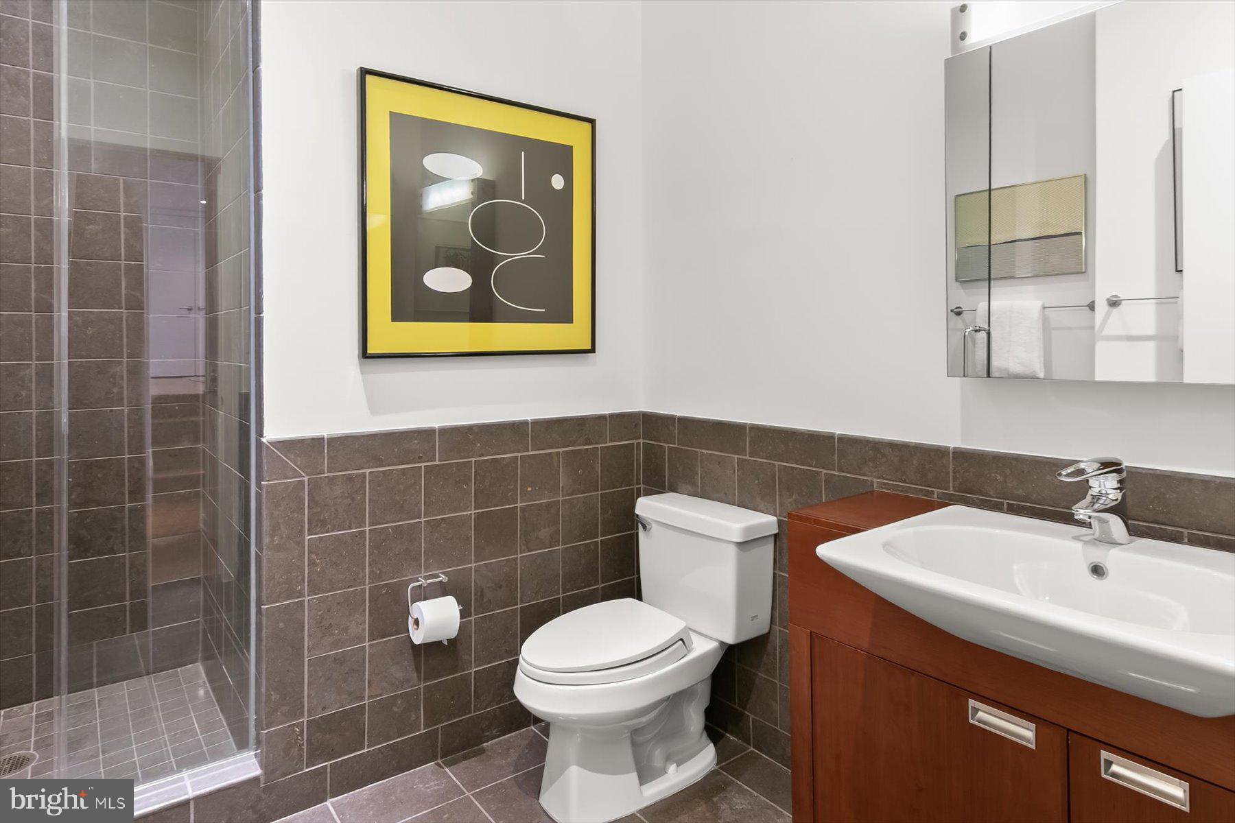1413 P Street Northwest, Unit 301 Washington, DC 20005 - Photo 15 of 25 Spacious and Well-Appointed Hall Bath