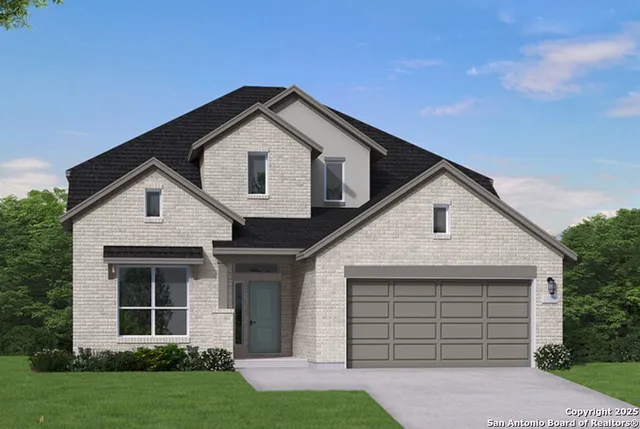 a front view of a house with a yard and garage