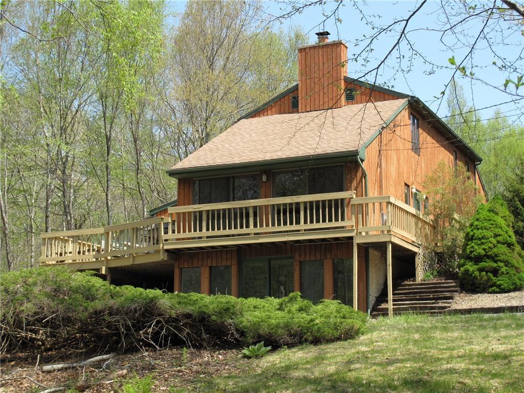71 Laurel Wood Road North Stonington, CT 06359 - Photo 1 of 1 Privately set on 3.02 acres with wrap around porch and walk out lower level.