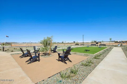 a view of a swimming pool and an outdoor space
