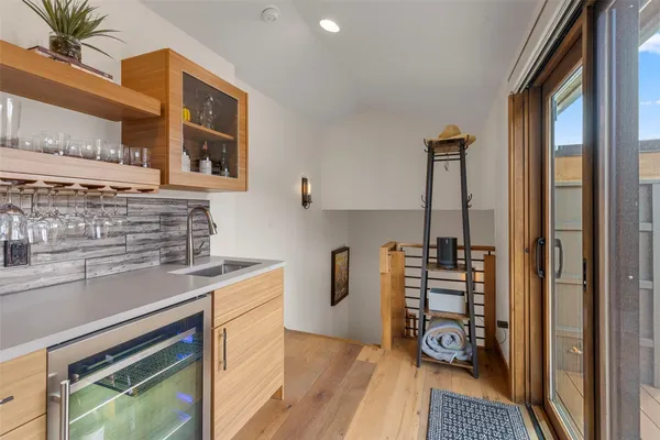 a bedroom with furniture and window