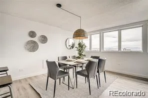 a view of a dining room with furniture window and outside view