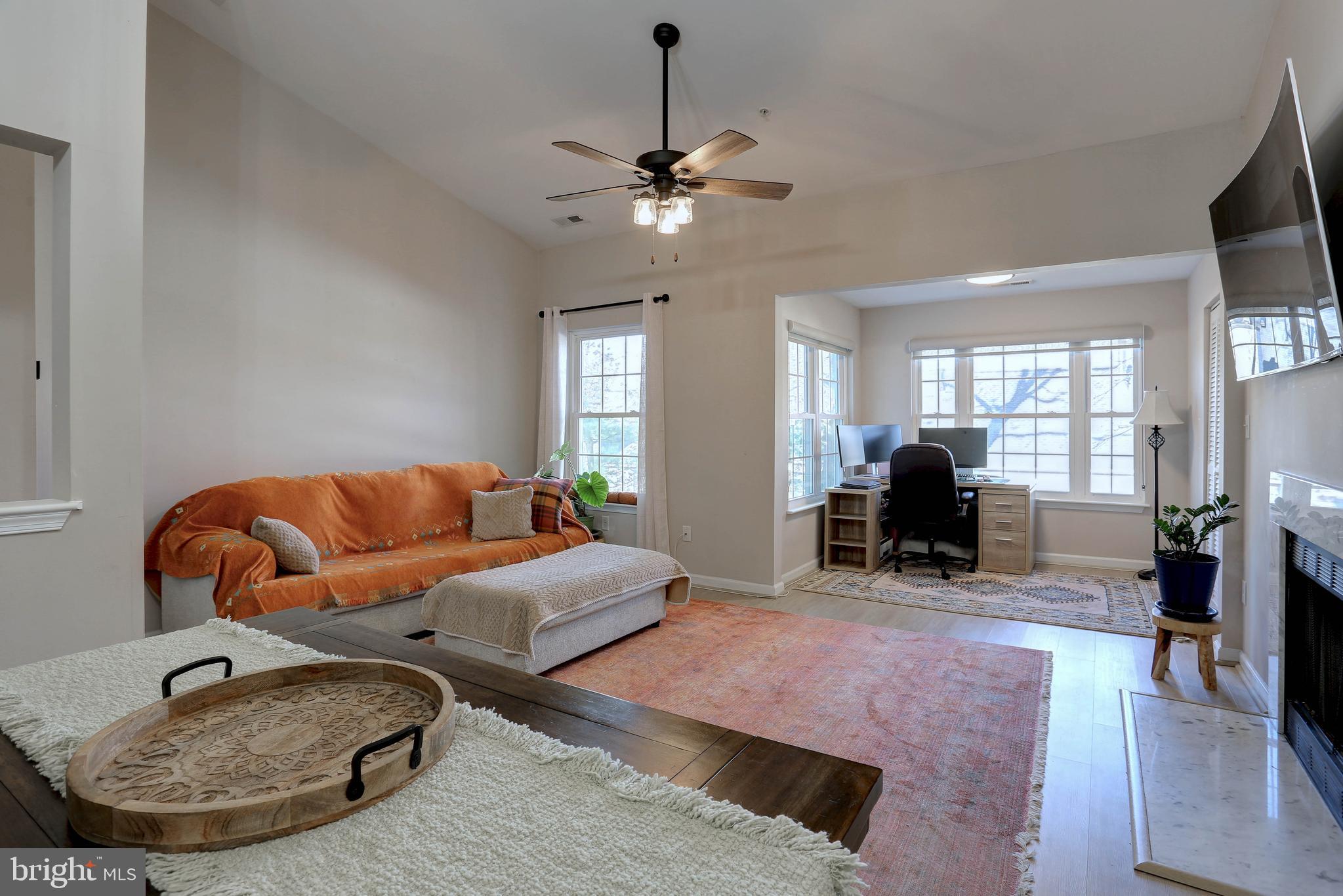 602 Moonglow Road, Unit 302 Odenton, MD 21113 - Photo 10 of 24 a living room with furniture and a chandelier