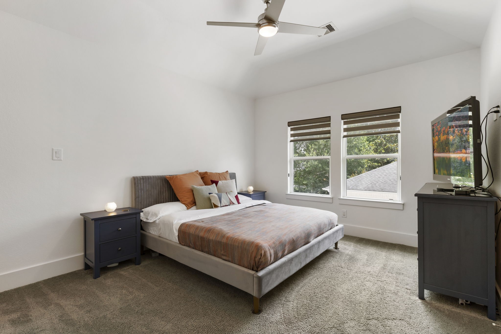 3918 Almond Court Spring, TX 77386 - Photo 27 of 42 a bedroom with a bed and a large window