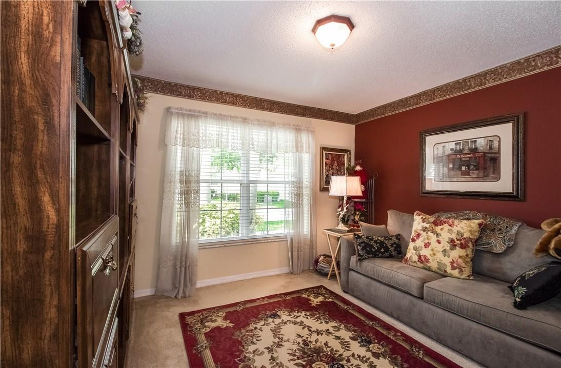 17445 Southwest 33rd Court Miramar, FL 33029 - Photo 11 of 23 a living room with furniture and a rug