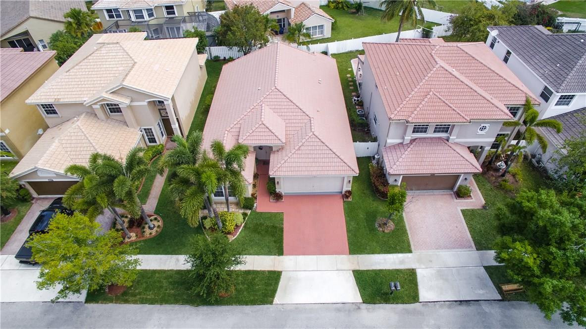 17445 Southwest 33rd Court Miramar, FL 33029 - Photo 17 of 23 an aerial view of a house with garden space and street view