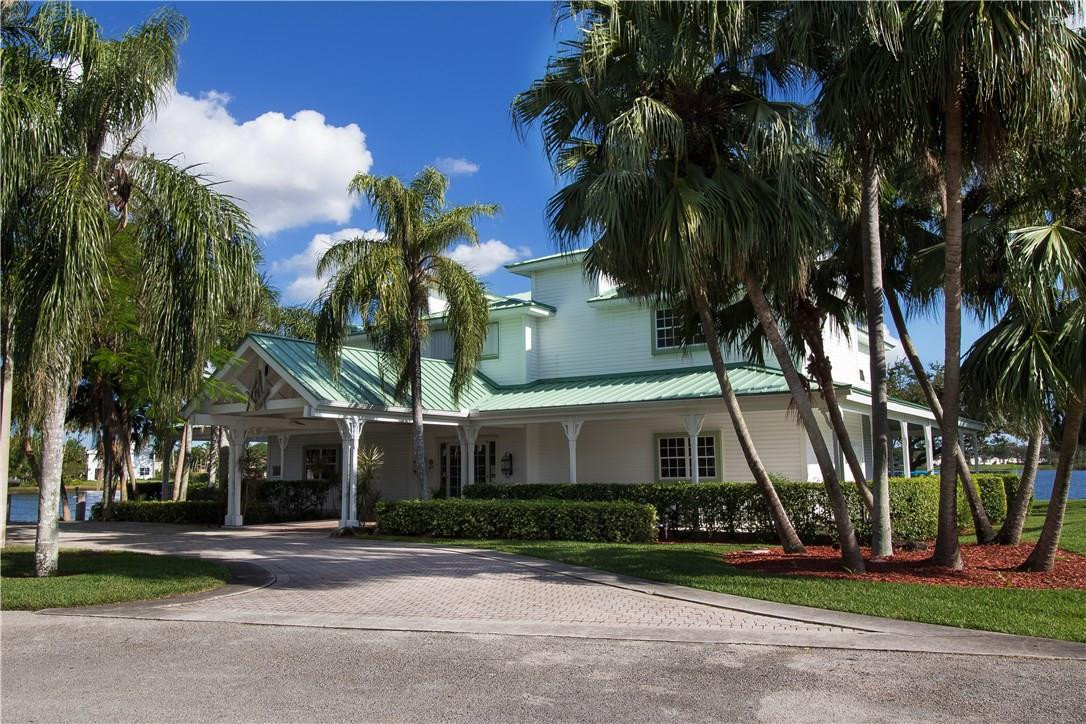 17445 Southwest 33rd Court Miramar, FL 33029 - Photo 22 of 23 front view of house with a yard and palm trees