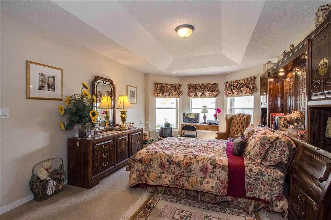 17445 Southwest 33rd Court Miramar, FL 33029 - Photo 5 of 23 a bed room with a bed and a computer on a desk