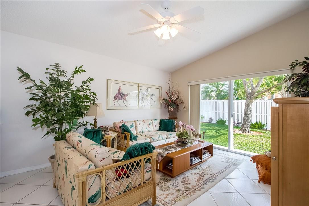 17445 Southwest 33rd Court Miramar, FL 33029 - Photo 7 of 23 a living room with furniture and a large window