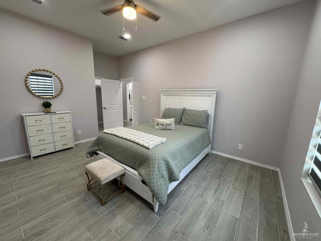 2007 Cassandra Street Mission, TX 78572 - Photo 4 of 10 a bedroom with a bed and dresser