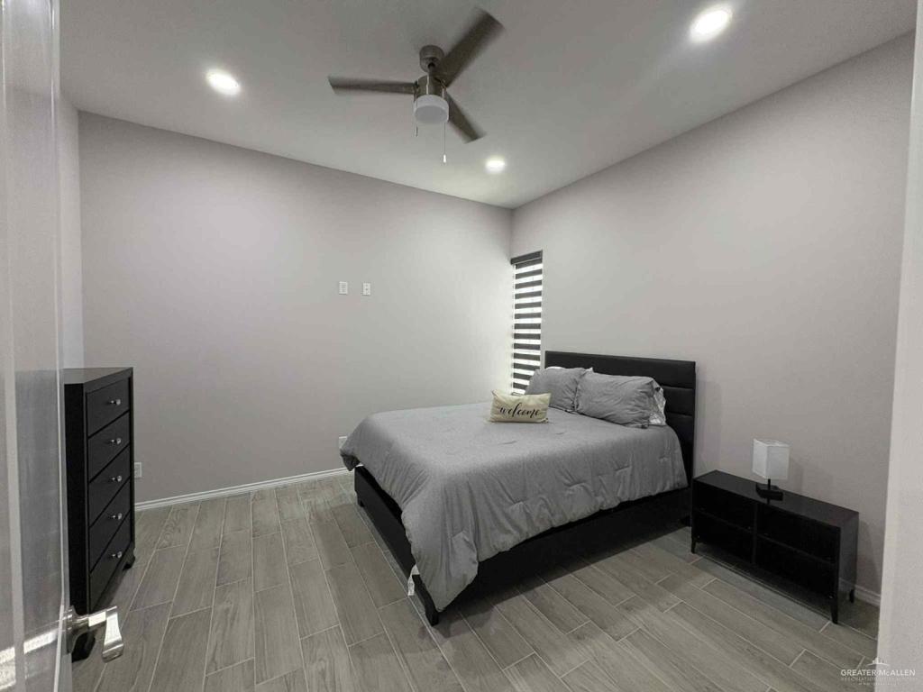 2007 Cassandra Street Mission, TX 78572 - Photo 6 of 10 a bedroom with a bed and a walk in closet