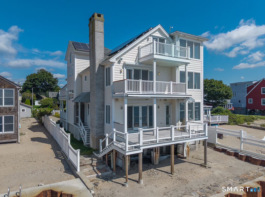 167 Shore Road Clinton, CT 06413 - Photo 36 of 40 Stairs off main level from deck and full bath for easy access to the beach