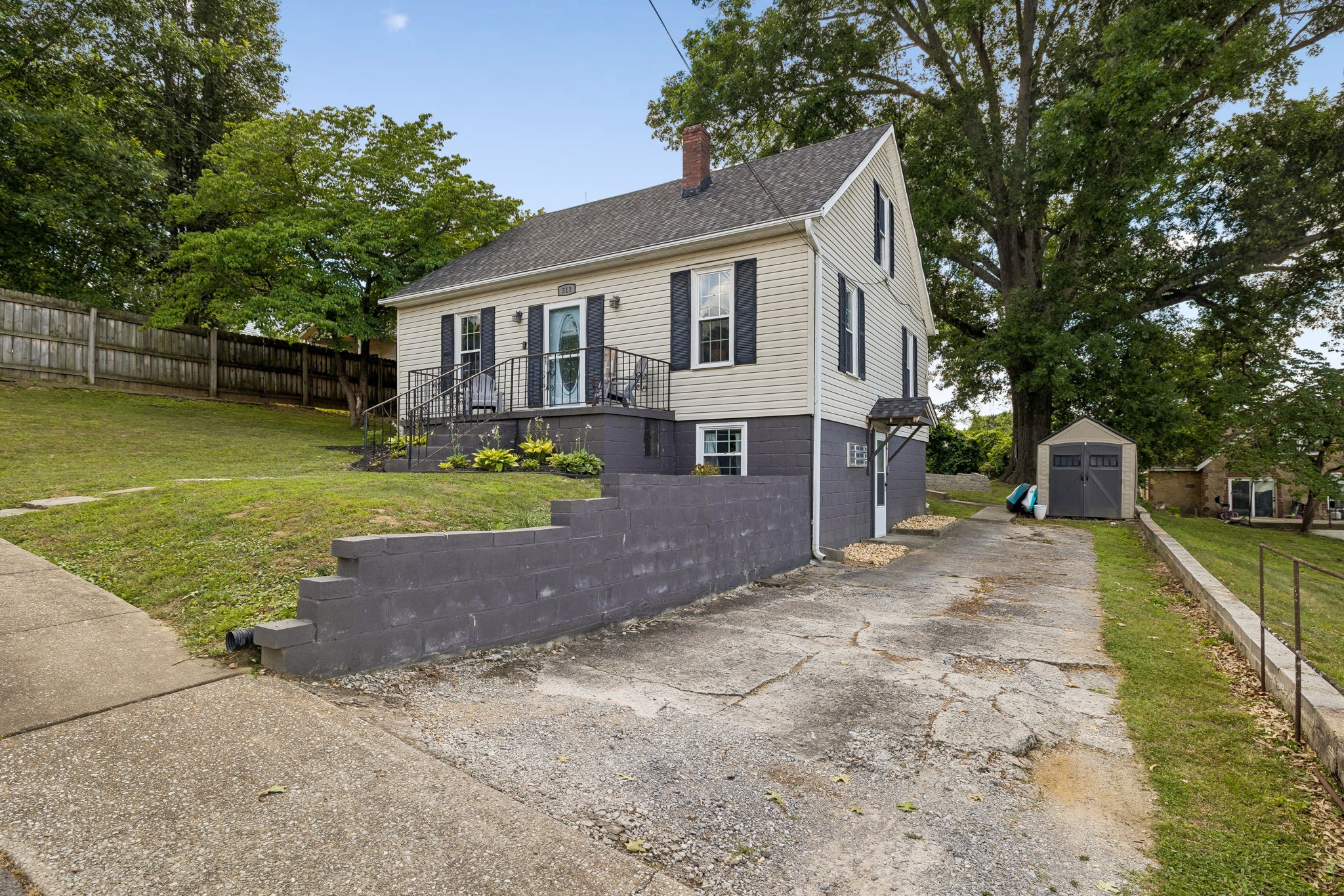 313 Cullum Street Carthage, TN 37030 - Photo 4 of 60 a view of a house with a yard and sitting area