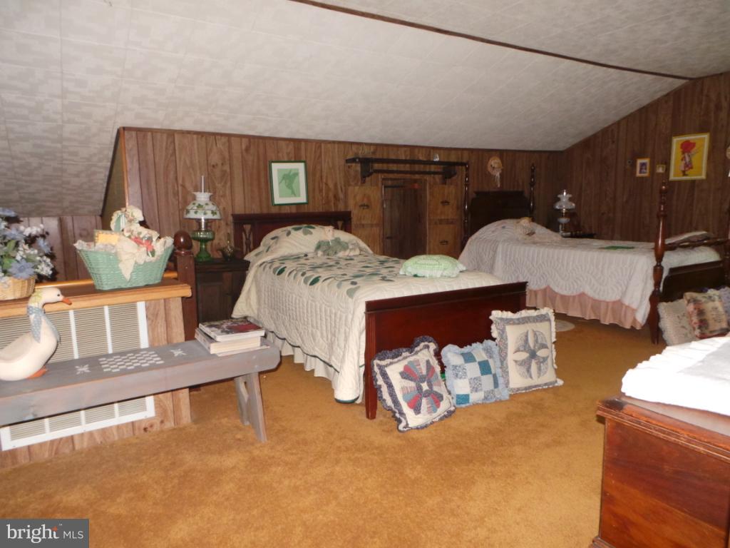 1373 Audubon Road Hedgesville, WV 25427 - Photo 14 of 30 loft bedroom with 4 twin beds and closets