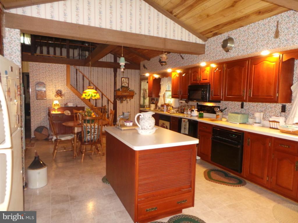 1373 Audubon Road Hedgesville, WV 25427 - Photo 8 of 30 center island and cherry cabinets