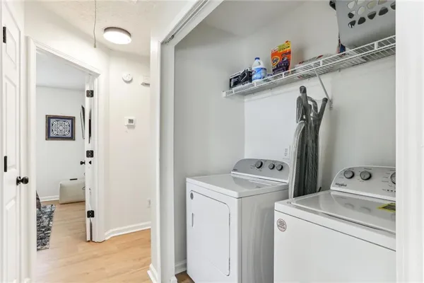 a utility room with dryer and washer