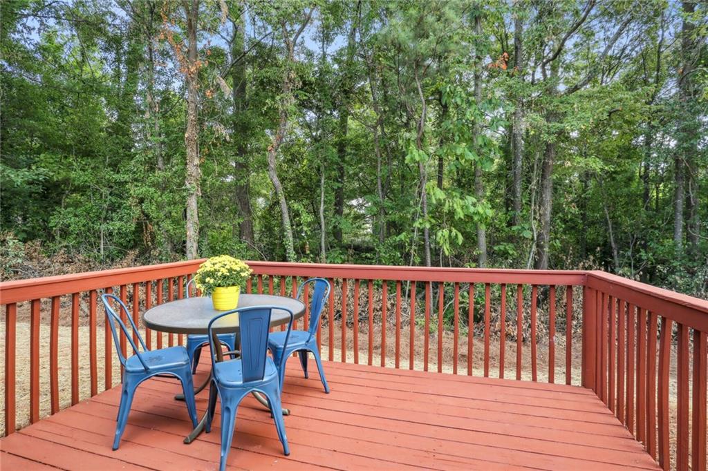 859 Springchase Drive Austell, GA 30168 - Photo 26 of 28 a view of balcony with furniture and trees