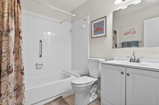 a bathroom with a toilet sink and a bathtub