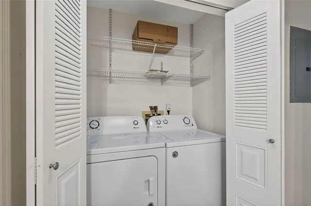 a utility room with dryer and washer