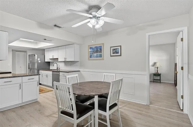 a view of kitchen and dining area