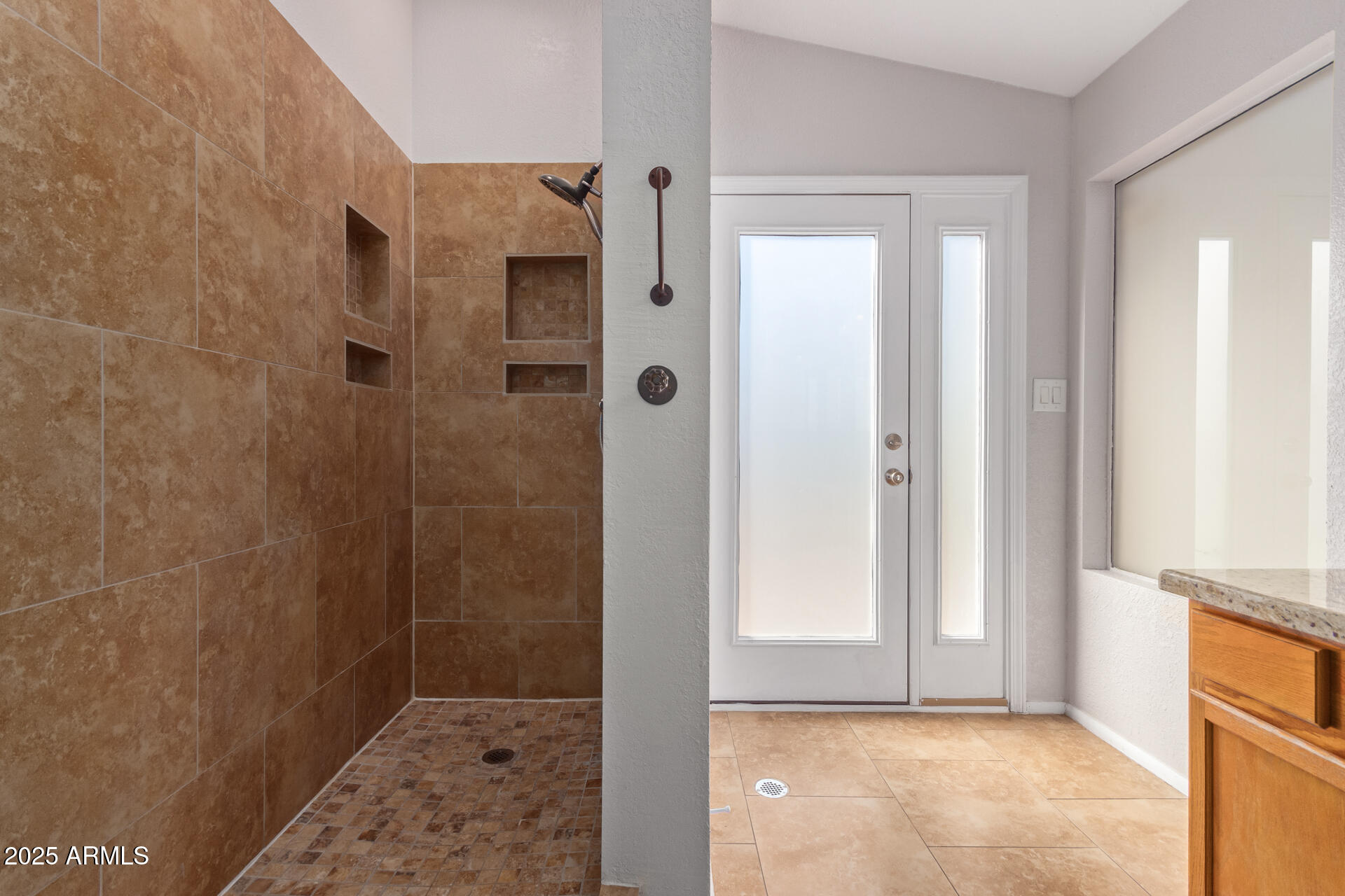 208 East Devon Drive Gilbert, AZ 85296 - Photo 18 of 37 a bathroom with a shower and a sink