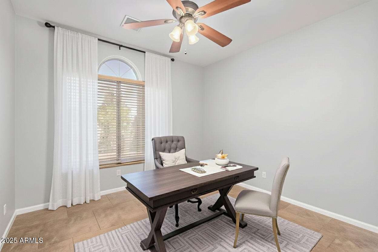208 East Devon Drive Gilbert, AZ 85296 - Photo 23 of 37 a view of a dining room with furniture
