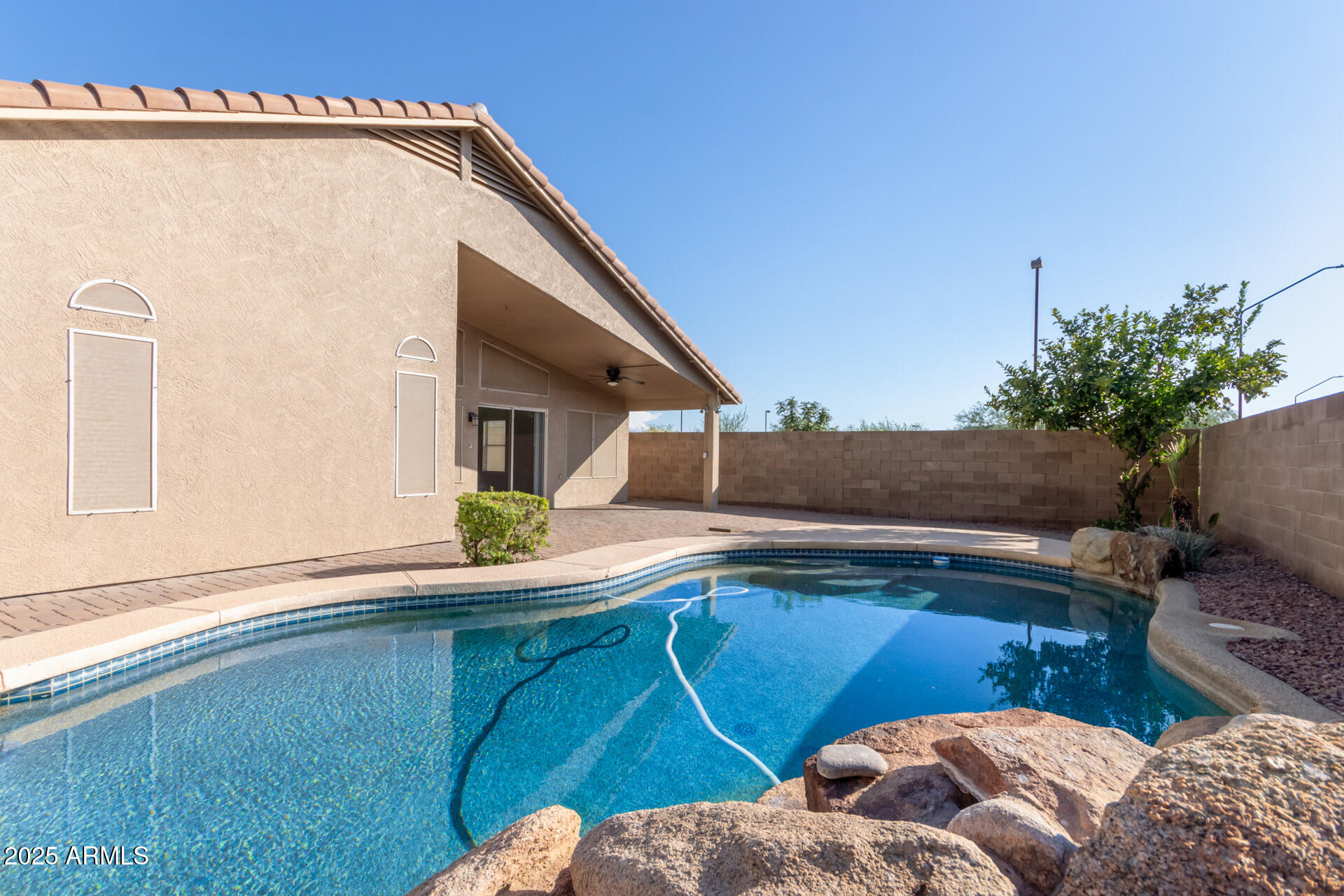 208 East Devon Drive Gilbert, AZ 85296 - Photo 36 of 37 a view of a house with a backyard