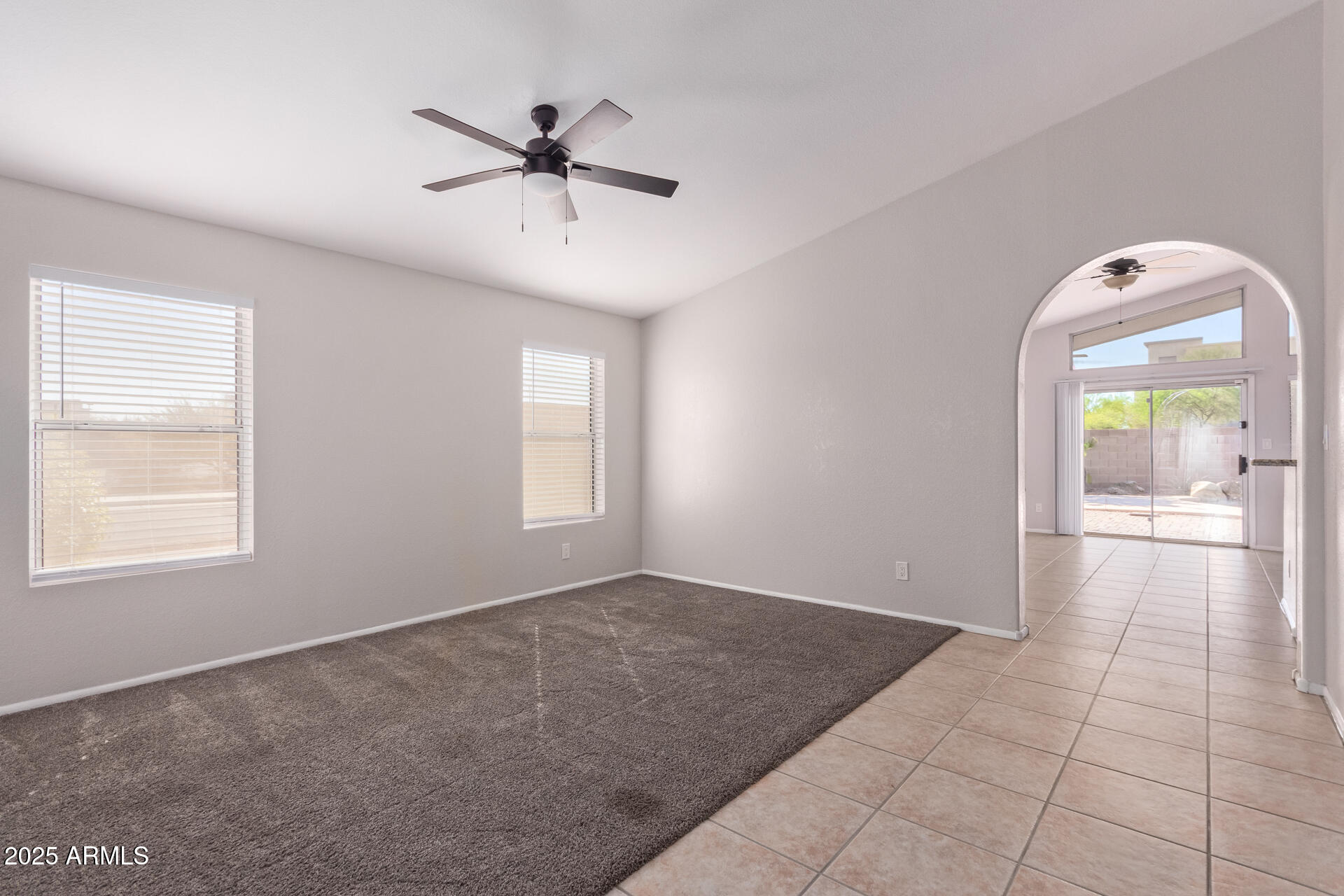 208 East Devon Drive Gilbert, AZ 85296 - Photo 5 of 37 a view of an empty room and window