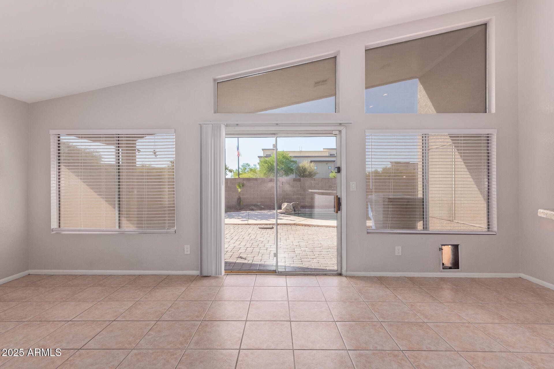 208 East Devon Drive Gilbert, AZ 85296 - Photo 7 of 37 a view of an empty room and window