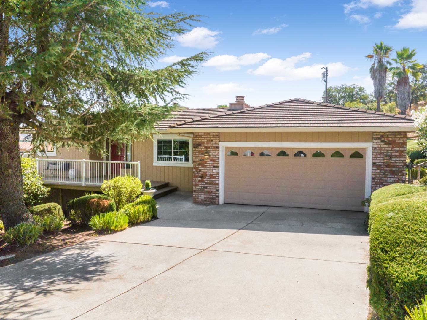 19573 Almaden Road San Jose, CA 95120 - Photo 1 of 41 a view of a house with a garden